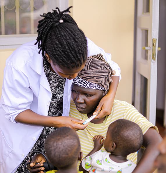 Doctors On Mission International doctor caring for children